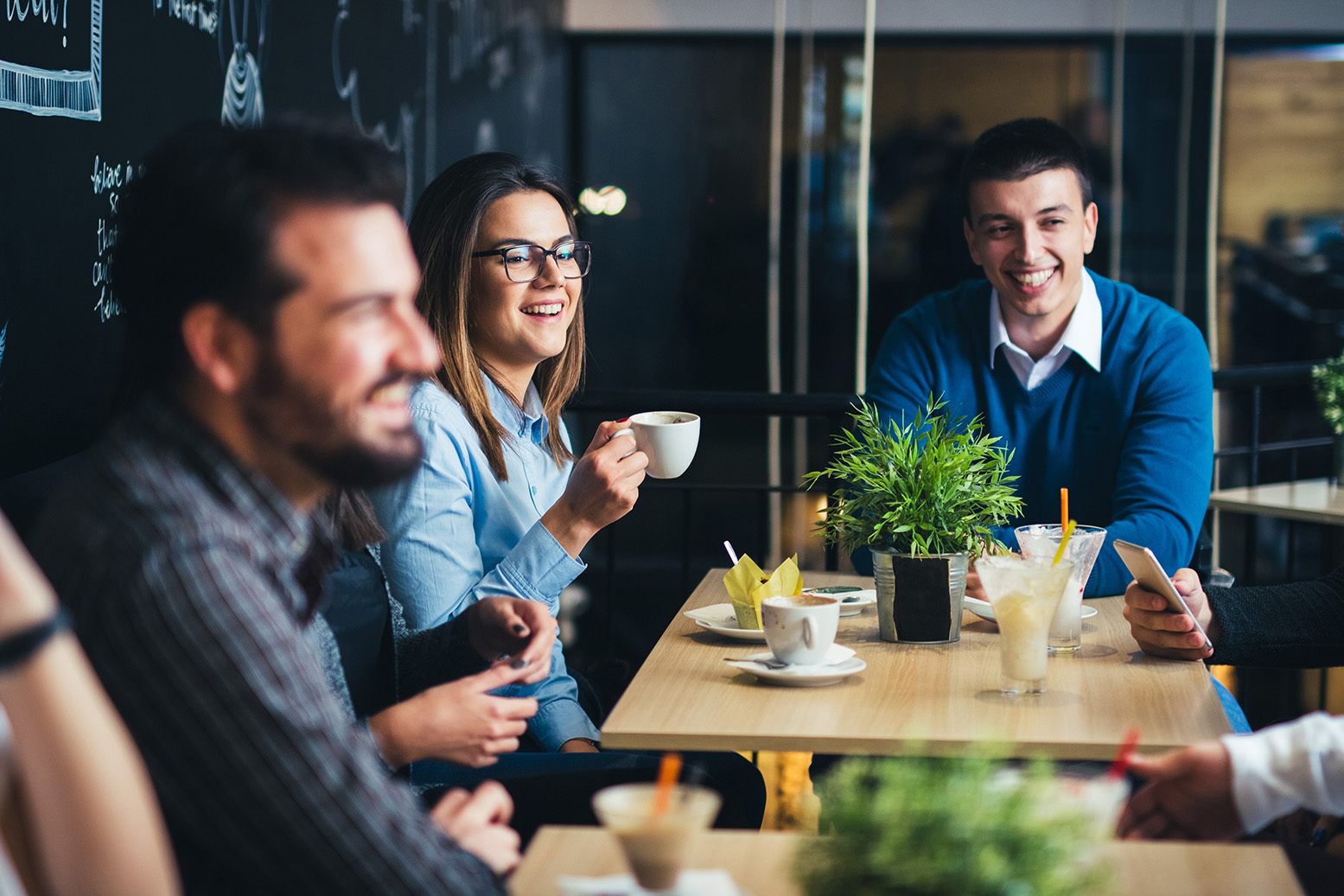 Coworkers at lunch break in a coffee shop