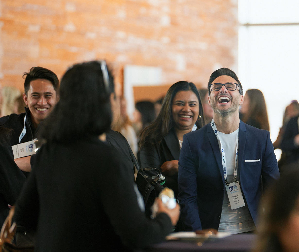 A group of peers laughing together