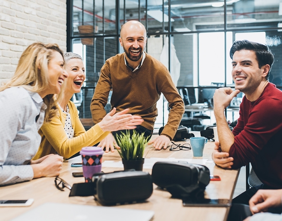 Coworkers laughing together